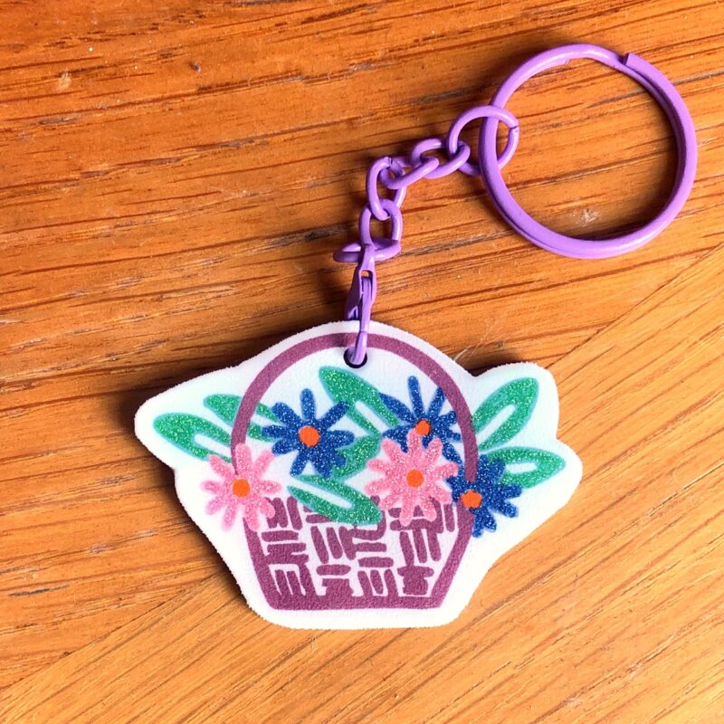 Gri-gri panier de fleurs violettes – Porte-clés Fleurs Paillettes Lilas Violet – Bijou de sac printanier mignon - Cadeau pour elle